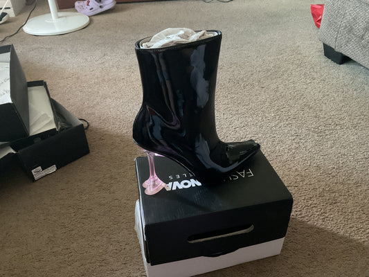 Black vinyl boots with pink heart heel